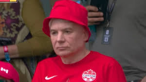 Hollywood legend, 63, looks unrecognisable in bucket hat at World Cup clash as BBC commentators don't even notice