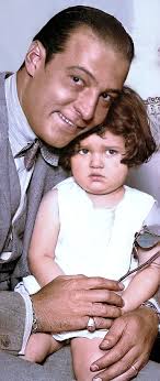 Rudolph Valentino holding little Gloria Corea in San Francisco in the  summer of 1926 just before traveling east