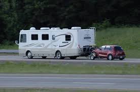 Towing a car behind a motorhome. Flat Towing Dinghy Towing Guide