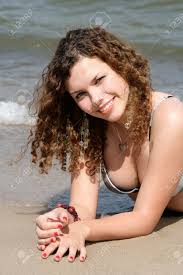 #down #going down #feeling down #laying down #tbd. Teenage Girl Lying On Sand On The Beach Stock Photo Picture And Royalty Free Image Image 12177546