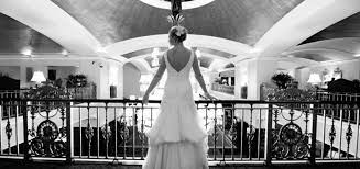 In connection with the exhibition on the life of princess diana coming to the grand rapids art museum, chefs at the amway grand plaza hotel have recreated a wedding cake from the july 1981 wedding. Bride Overlooking Her Guests From The Balcony Of Amway Grand Plaza Hotel Classically Beautiful Black And White Image Rs Grand Plaza Wedding Corporate Events