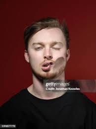 24 Wind Distorted Face Stock Photos, High-Res Pictures, and Images