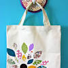 The tim suit tote design is a definite head turner! 1