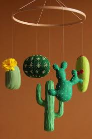 Also, if you happen to see a plant flowering, you can tell a cactus apart these other plants fairly easily. Baby Mobile Cactus Baby Mobile Cactus Nursery Decor Nursery Etsy Baby Mobile Girl Baby Boy Mobile Green Nursery