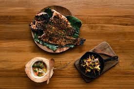 Potato head bali, prides itself on its majestic sight of distinct indonesian teak window shutters and its recognition by conde nast traveller as a real institution of bali and one that you must visit ! Seafood Restaurant In Seminyak Desa Potato Head Bali
