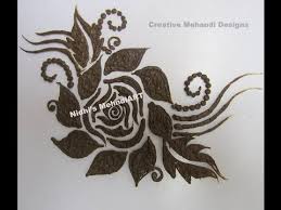 This mehndi design is quite different from the rest of the simple mehandi designs that we have discussed earlier. How To Draw Easy Rose Flower Patch In Henna Mehndi Design Tutorial Roses Drawing Mehndi Designs Henna Mehndi Design