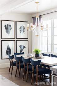 The shining star of this welcoming living room is the view outside the many windows. Love The Clean Transitional Style Of This Dining Room Ivory Lane Kitchen Alice Lane Home I Mid Century Dining Room Dining Room Design Dining Room Inspiration