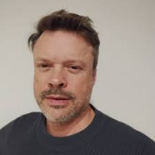 Is Scrabble played in countries in a language other than the native  language, not including English, for example Spanish language Scrabble in  former Spanish colonies, French language Scrabble in former French colonies?