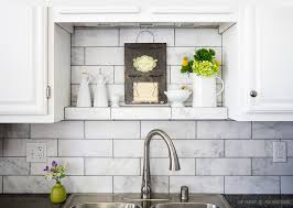 Id like to to a white subway tile with darker grout. Large White Subway Marble Kitchen Backsplash Tile With Black Countertop And White Cabinets From Backsplash Com Backsplash Com