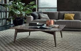 Handcrafted with solid mango wood, this coffee table has black metal frames and legs. Coffee Tables Poliform Bigger