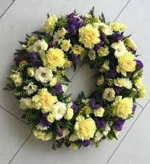 Purple and yellow funeral flowers. Yellow Purple Loose Wreath Tribute Buy Online Or Call 0115 940 0033