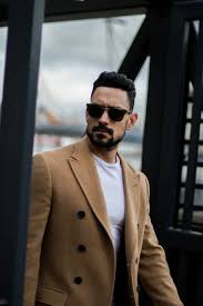The camel coat is still fall's swankiest outerwear style. How To Wear A Camel Coat 5 Ways Men S Style Blog