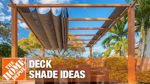 The shade is simply made of an outdoor fabric and 4 bamboo posts which can get it done quickly. Deck Shade Ideas The Home Depot