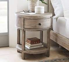 You know, like a night stand that doubles as an end table and a decorative object? Toulouse 23 Round Nightstand Pottery Barn