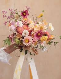 Use elaborate masks and beaded necklaces in your décor, and go for a purple, green, and gold color scheme. Wedding Bouquet Flower Arrangements Beautiful Flowers Wedding Flower Inspiration