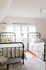 They are also so inexpensive, which makes the move to a wrought iron bed much easier on the pocket book. Wrought Iron Beds You Can Crush On All Day Shared Girls Room Shared Girls Bedroom Iron Bed Frame