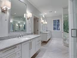 The wood's light finish doesn't hinder the contrasting textures play up the white walls and accessories in this bathroom to create a simple and clean look. 75 Beautiful Light Wood Floor Bathroom With White Cabinets Pictures Ideas June 2021 Houzz