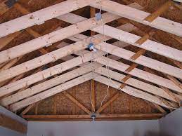 Cutting roof trusses is possible, but a structural engineer must design the plan for the truss modification to prevent roof collapse. Gaining Ceiling Height Via Trusses The Garage Journal Roof Truss Design Roof Trusses Roof Truss