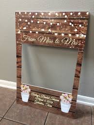 Choose from our complete selection of personalized bride and groom picture frames. Photo Frame Prop For Bridal Shower And Wedding By Inphinity Designs Yes I Make Them For Local Pick Bridal Shower Rustic Bridal Shower Diy Bridal Shower Photos