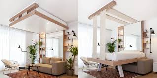 This unusual looking living room in london has a bed suspended through the ceiling. 5 Reasons To Buy A Ceiling Bed Other Than Space Saving