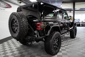 2020 Jeep Wrangler Rubicon Black And Red 2018 2020 Jeep Wrangler Jl Tire Carrier Shop Now Jeep Wrangler Wrangler Jl Jeep