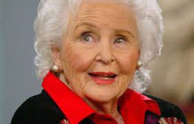 When Col Joy and the Joy Boys came to town with Little Pattie and Johnny  Farnham, but who is the lady with the dark hair and sunglasses?