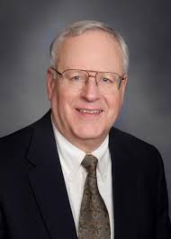 Huggins' retirement caps a century of Huggins Family Insurance service