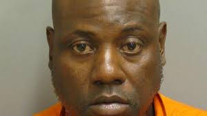 Man arrested, charged with rape of female coworker