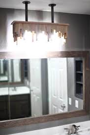 It's also where i got the ceiling fan blades for my windmill wall art and the chandelier for my hummingbird. How To Build A Diy Bathroom Light Fixture From Ceiling Thediyplan