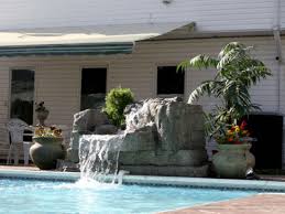 A swimming pool fountain can create added value and peace to your swimming pool. How To Install A Pool Waterfall Hgtv