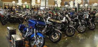To communicate or ask something with the place. Harley Davidson Biketown