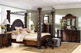 The canopy bed features a removable canopy atop four majestic columns and an upholstered headboard, providing. Ashley Furniture Bedroom