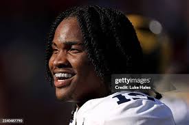 Michigan Wolverines linebacker Ernest Hausmann tries to tackle USC... News  Photo