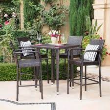 It's a bistro table that stands at a 28.54 in. Bar Height Patio Dining Sets Patio Dining Furniture The Home Depot