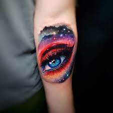 Bright Cosmic Tattoos By Tyler Malek Inkppl Bright Tattoos Cosmic Tattoos Eyeball Tattoo