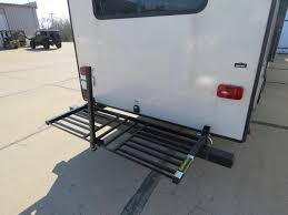 Lippert Components Flip Down Slotted Bike Rack Tailgate Storage System Lippert Rv And Camper Bike Racks Lc243621