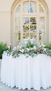 Elegant Minimalist White And Greenery Wedding Sweetheart Table Sweetheart Table Sweetheart Table Wedding Sweetheart Table Flowers Flower Centerpieces Wedding
