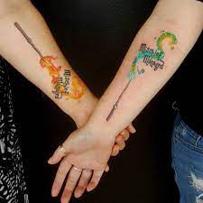 Two Friends From Two Different Houses Thanks For The Fun Tattoo Girls Harrypottertattoo Hogwarts Patronus Harry Potter Tattoos Hogwarts Tattoo Wand Tattoo