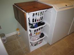 Built In Fold Down Laundry Shelf Shorter Brook Laundry Basket Dresser With Folding Table Laundry Basket Dresser Small Laundry Room Organization Laundry Table