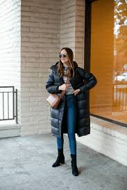 A gold puffer coat adds a luxe touch to your winter wardrobe. Everlane Re Down Sleeping Bag Puffer Coat Girl Meets Gold