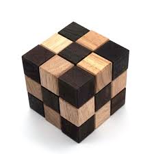 You need only follow a few simple steps to put these puzzles together quickly. Snake Puzzle Cube And 3d Puzzles For Adults In Hands With Wooden Designs Bsiri Games