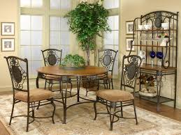 Tahoe wrought iron round dining table this dining table is a practical and elegant solution for dining rooms. Wrought Iron Dining Table And Chairs Off 53