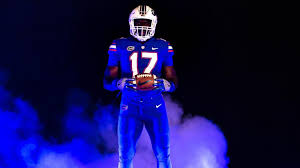 Maybe you would like to learn more about one of these? Florida Vs Michigan Gators Wearing All Blue Color Rush Nike Uniforms White Helmets Alligator Army