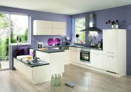 Modern gray, brown kitchen features front cabinets with granite countertops and tile backsplash with island and window. Kuchenfarben Diese Farben Passen Zusammen Mobelix