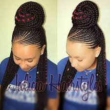 A cornrow braid is a type of plait that is woven flat to the scalp in straight rows and has a raised appearance, resembling rows of corn or sugarcane (hence their apt name). Pretty Updo Added To This Corn Roll Style Lovely Look Cornrow Hairstyles African Braids Hairstyles Braided Cornrow Hairstyles