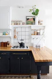In the kitchen, cabinets are above the electric cooking stove, they are approximately 2 feet from the stove top. The Kitchen Design Decisions That Drive Our Readers Crazy Kitchn