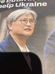 Hmm That kid standing next to me looks familiar