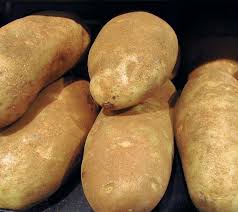 A russet potato is a type of potato that is large, with dark brown skin and few eyes. Nutrition Comparison Russet Potato Vs Banana