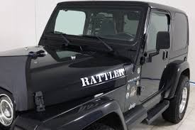Image result for Brilliant Black 2002 Jeep