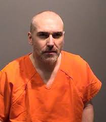 Suspect in townhome fire turns himself into police